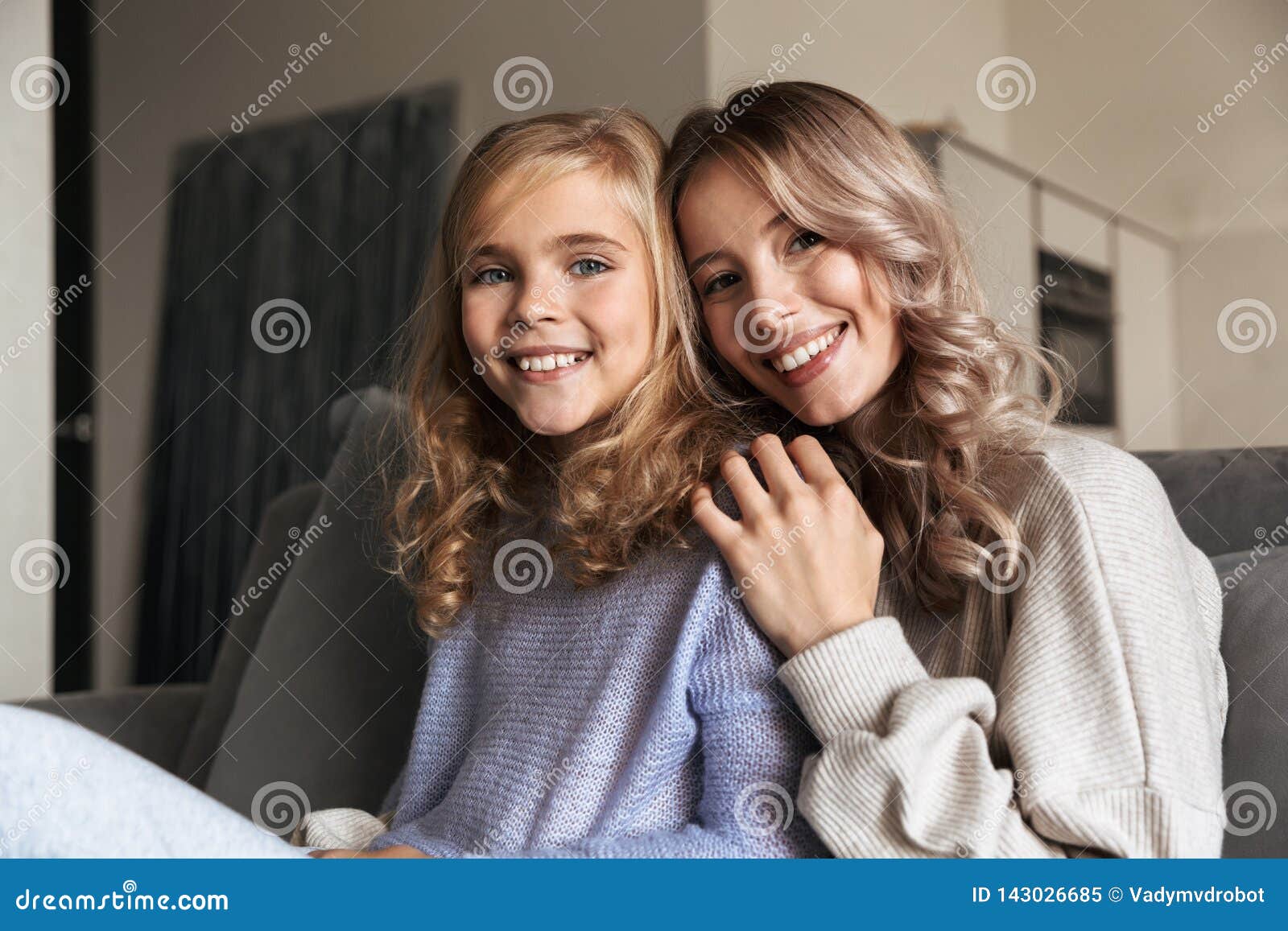 Woman with Her Little Sister Indoors at Home Stock Image - Image of ...