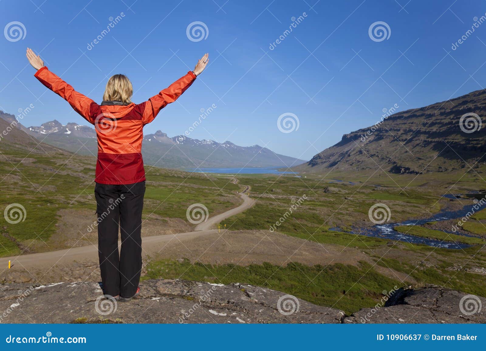 woman hiker in the berufjordur valley iceland