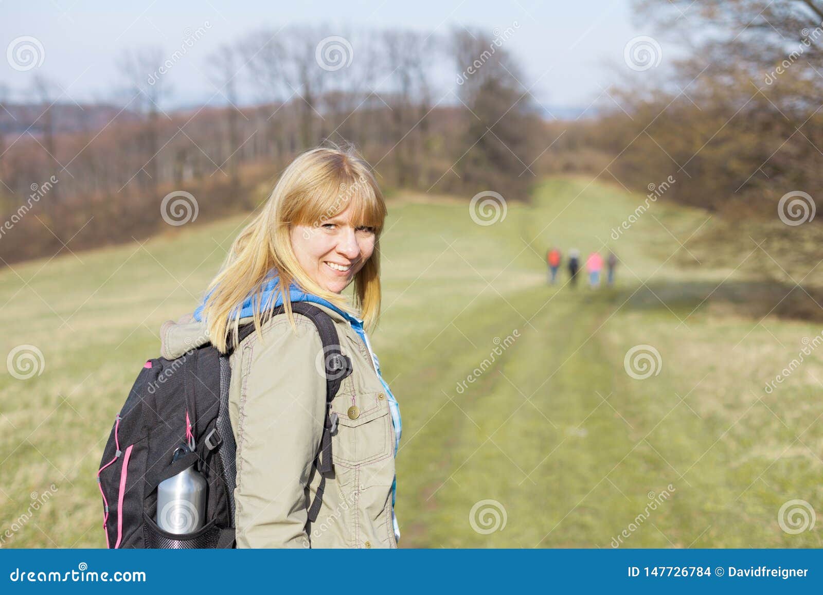 Woman is Hiking and Trekking Outside on a Hill. Tourism, Vacation and ...