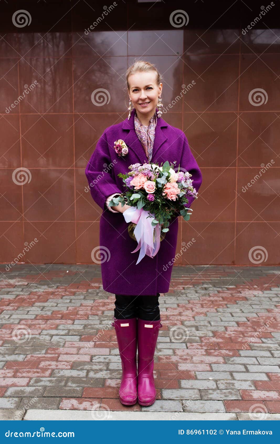 woman holding beautiful bouquet of flowers