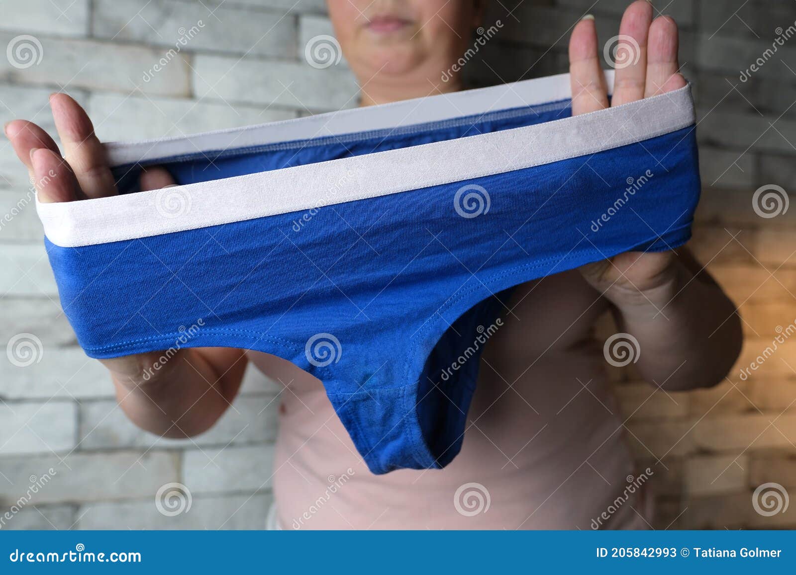 Woman Holding Blue Female Panties in Her Hands, Knitted Underwear ...