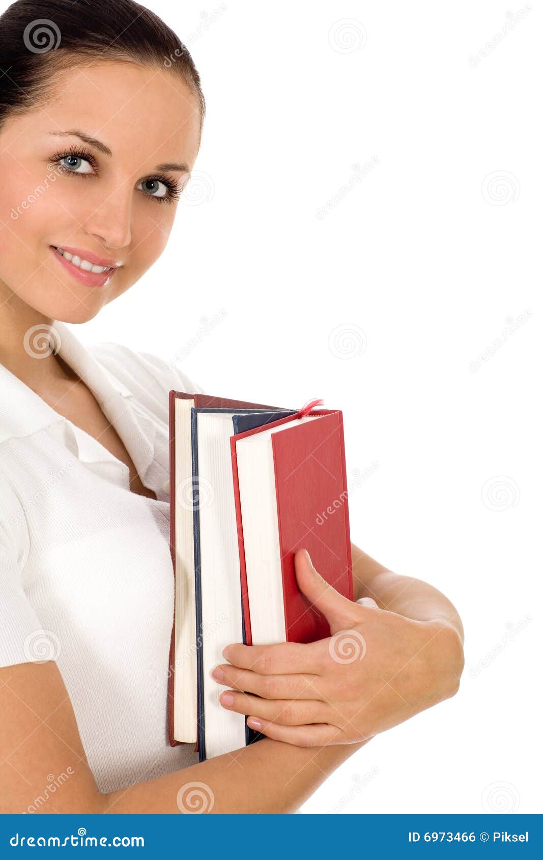 Woman holding books stock photo. Image of studio, smiling 6973466