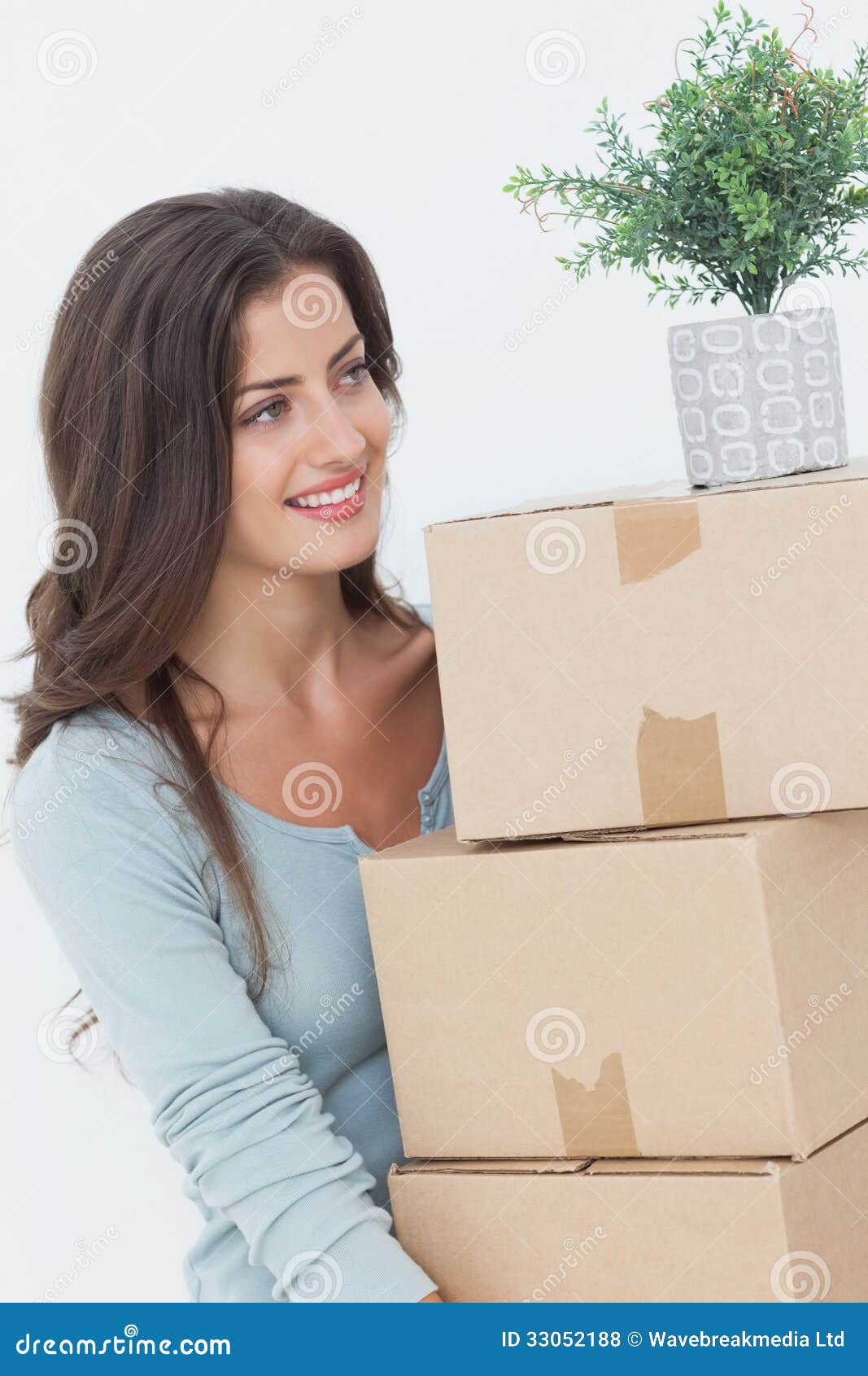 Woman Holding Boxes because she is Moving Stock Photo Image of