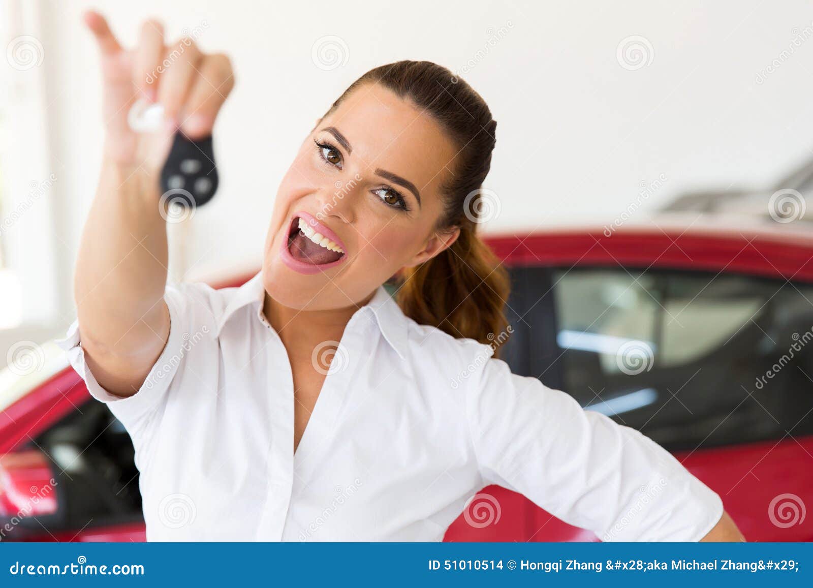 Woman holding car key stock photo. Image of purchasing - 51010514