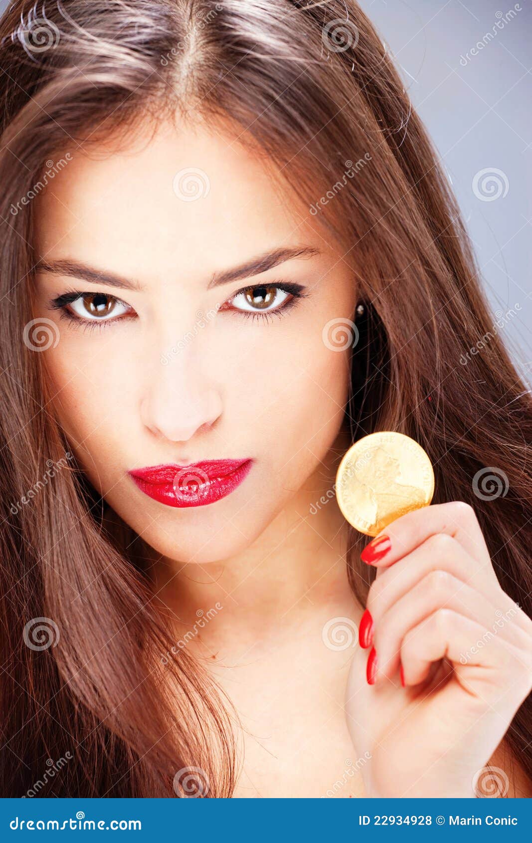 Woman holding coin, ducat stock photo. Image of coin 22934928