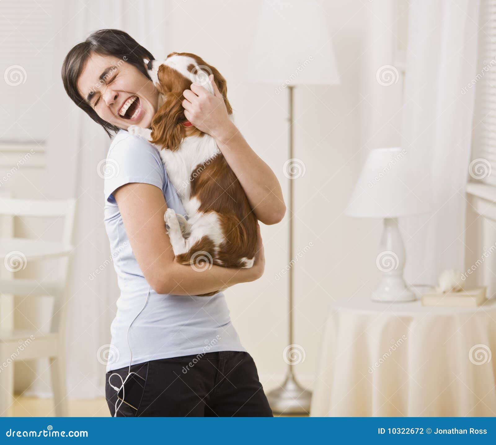 Woman Holding Dog stock photo. Image of diverse, adult 10322672
