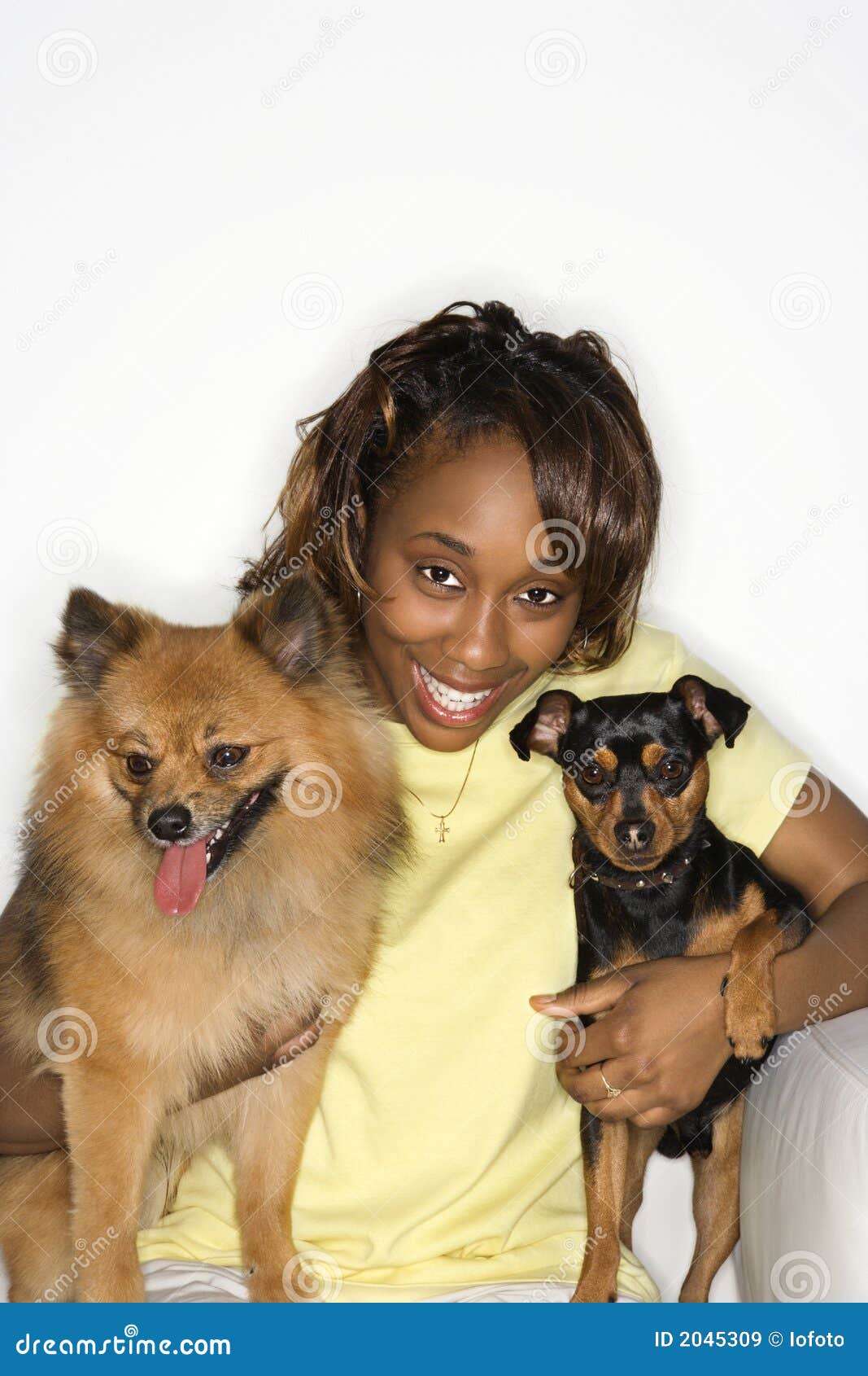 Woman holding dogs. stock image. Image of vertical, person 2045309
