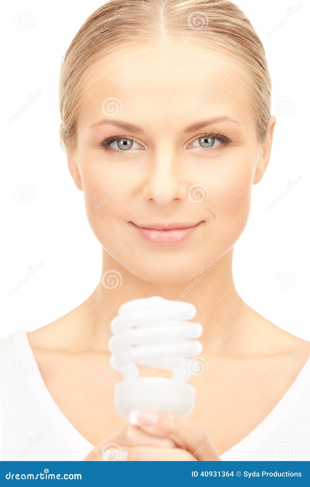 Bright picture of woman holding energy saving bulb