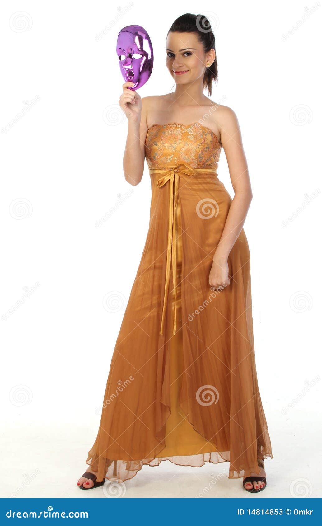 Woman holding face mask stock image. Image of carnival 14814853