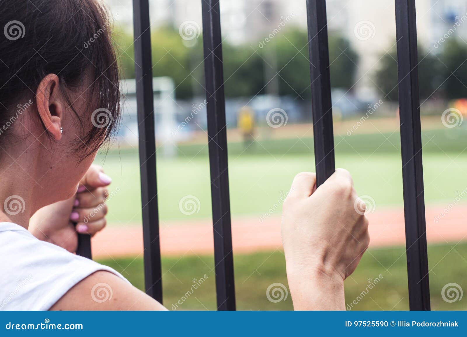 Woman Holding the Gate Looking at the Field Stock Photo Image of