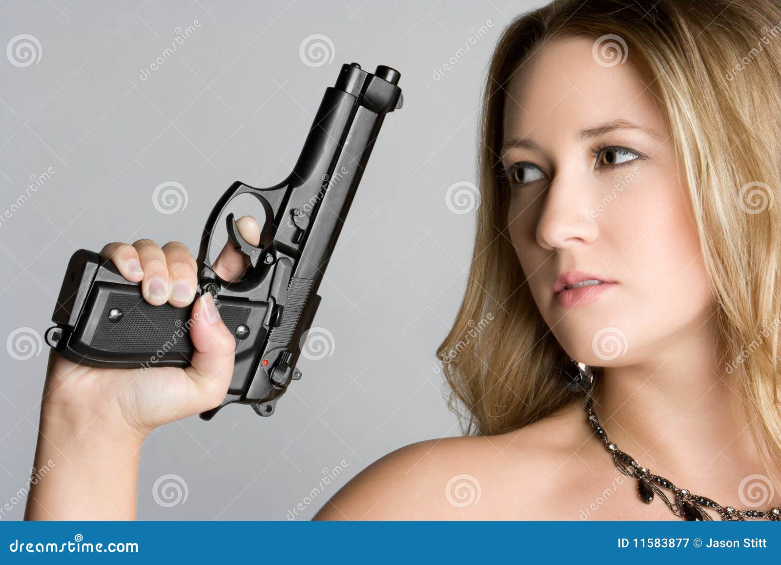 Woman Holding Gun stock image. Image of attractive, blonde - 11583877