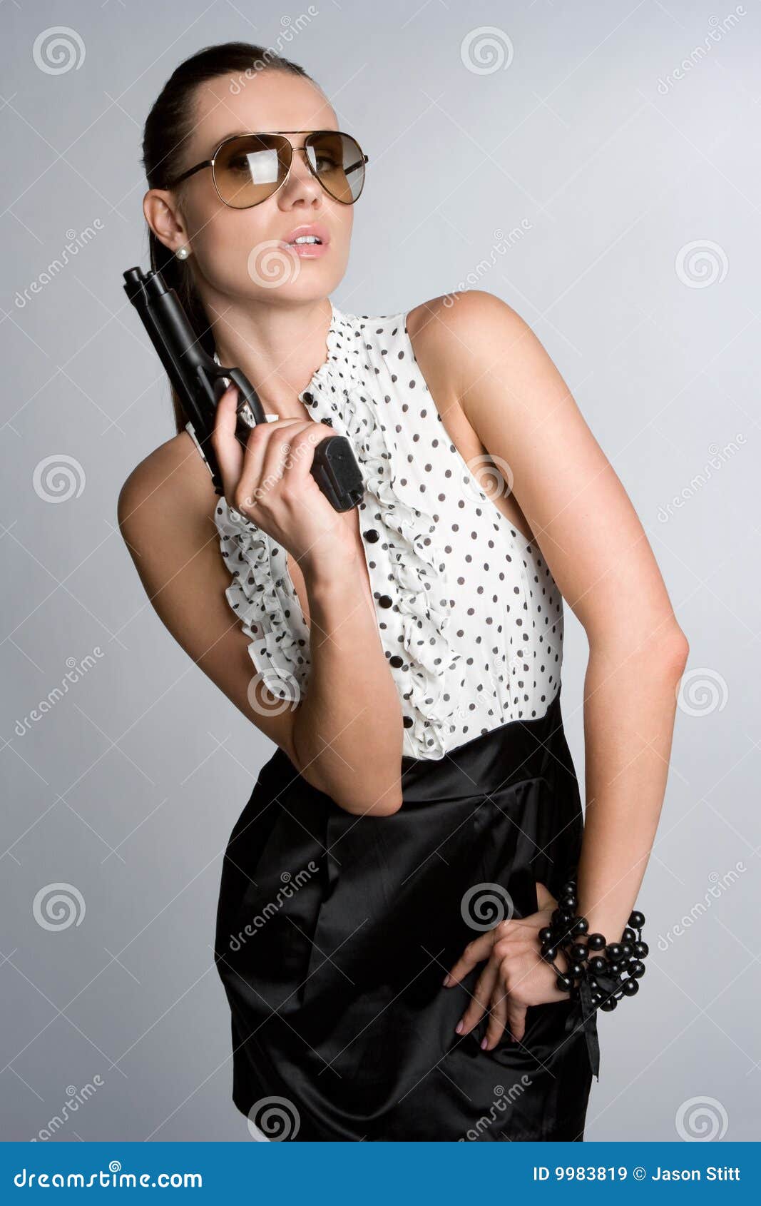 Woman Holding Gun stock image. Image of weapon, guns, sunglasses 9983819