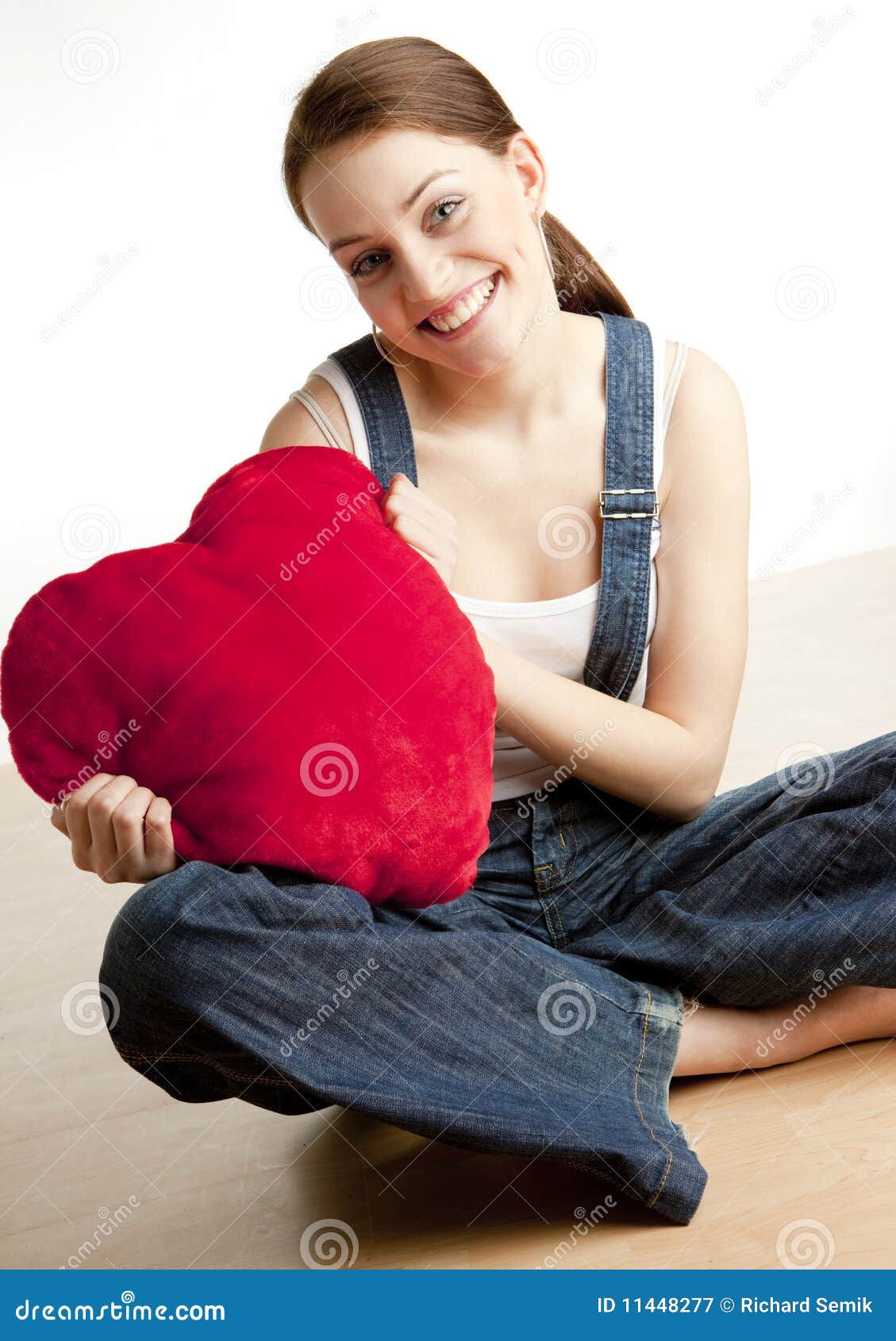 Woman holding a heart stock image. Image of expressions 11448277