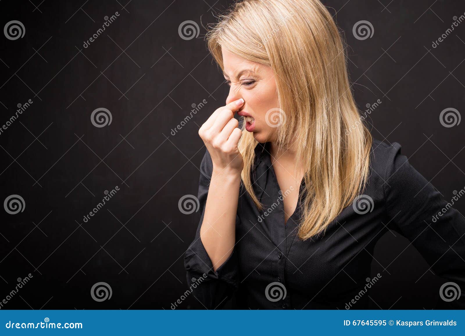 Woman holding her nose stock image. Image of woman, odor 67645595