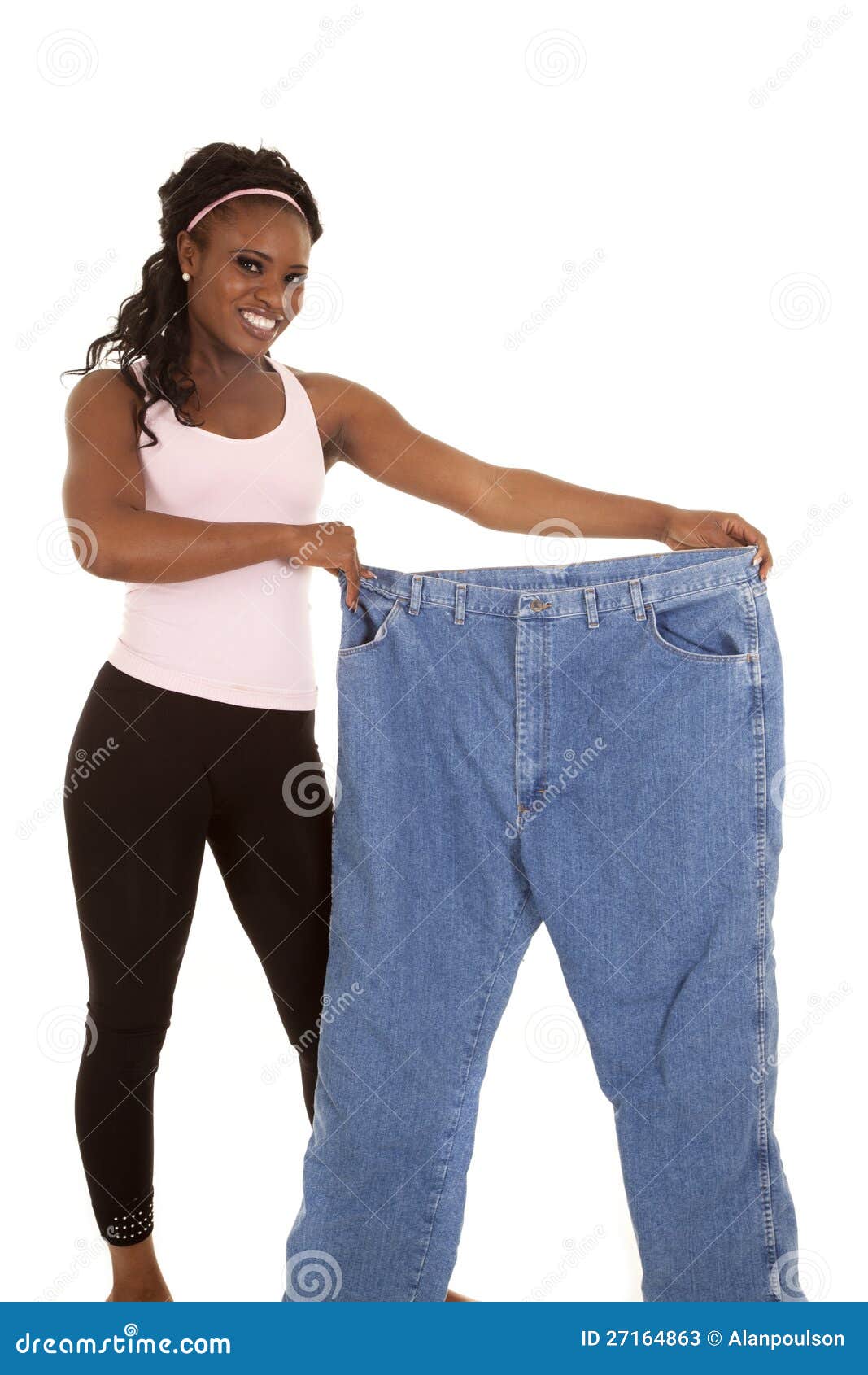 Woman holding huge pants stock image. Image of happy 27164863