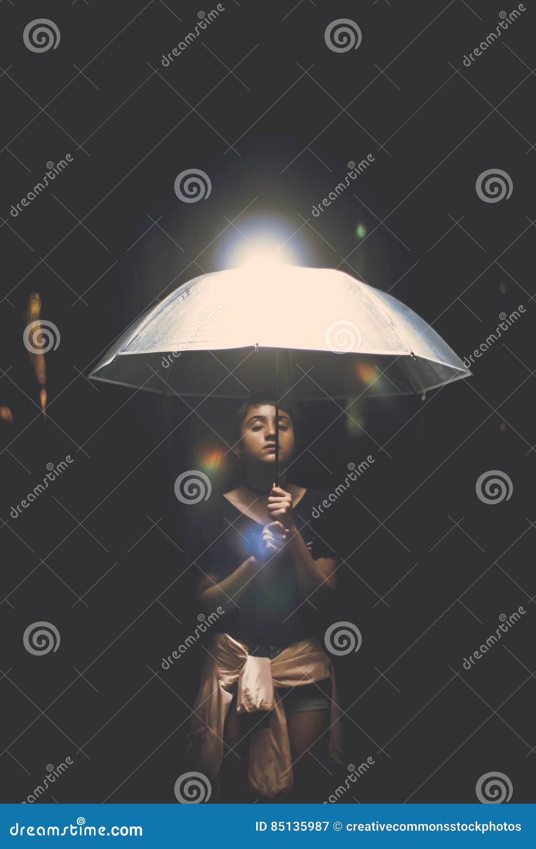 Woman Holding Illuminated Lamp At Night Picture. Image 85135987
