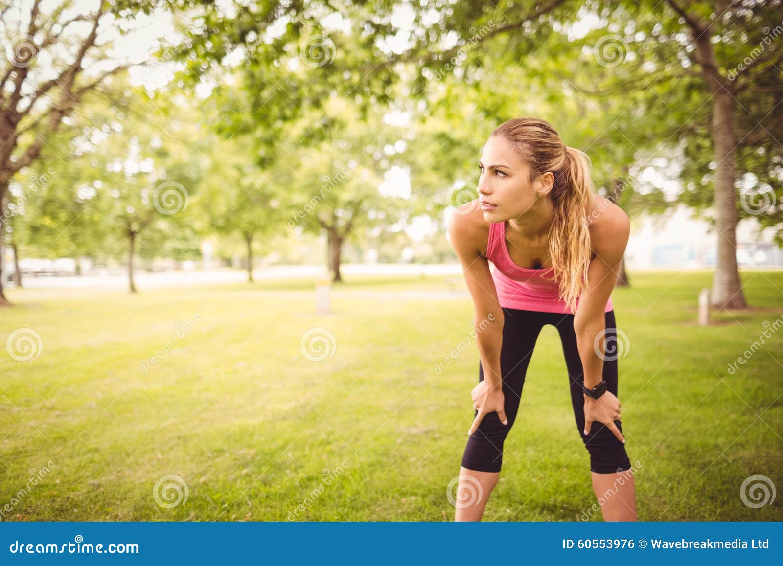 Woman Holding Knees in Park Stock Photo Image of leisure, holding