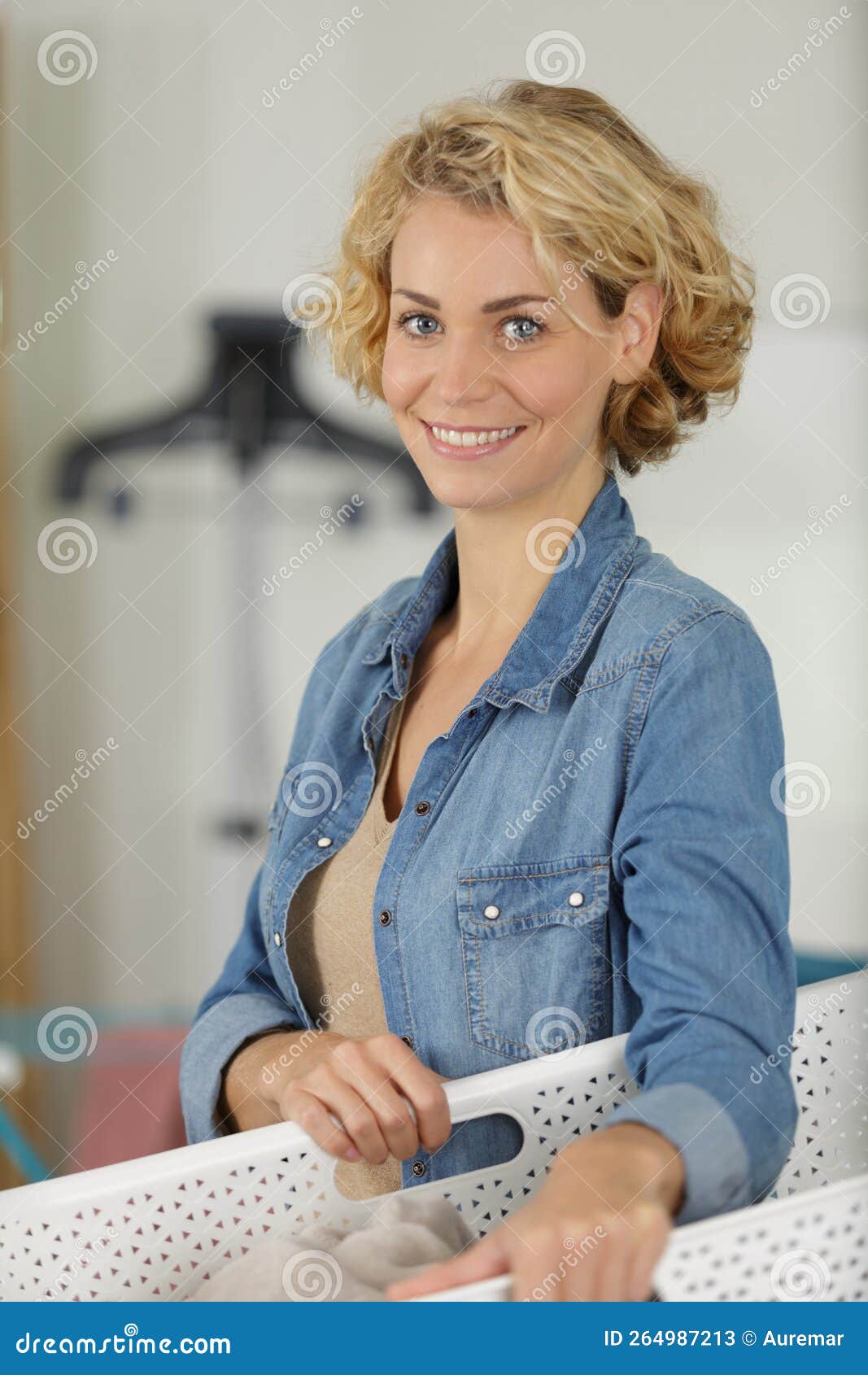 Woman Holding Laundry Basket Stock Image Image of female, caretaker