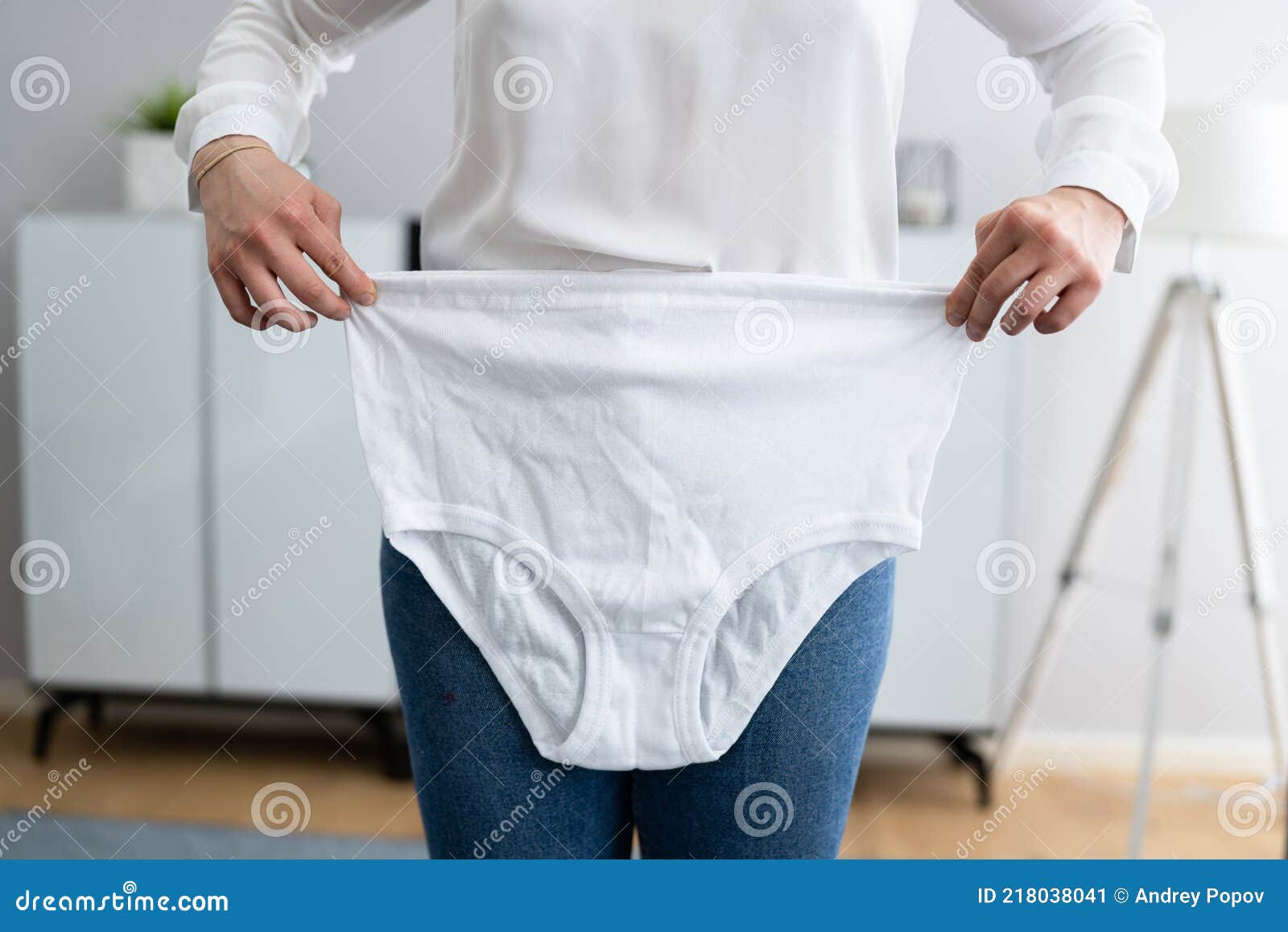 Woman Holding Loose Granny Underwear Stock Image - Image of lingerie,  indoors: 218038041