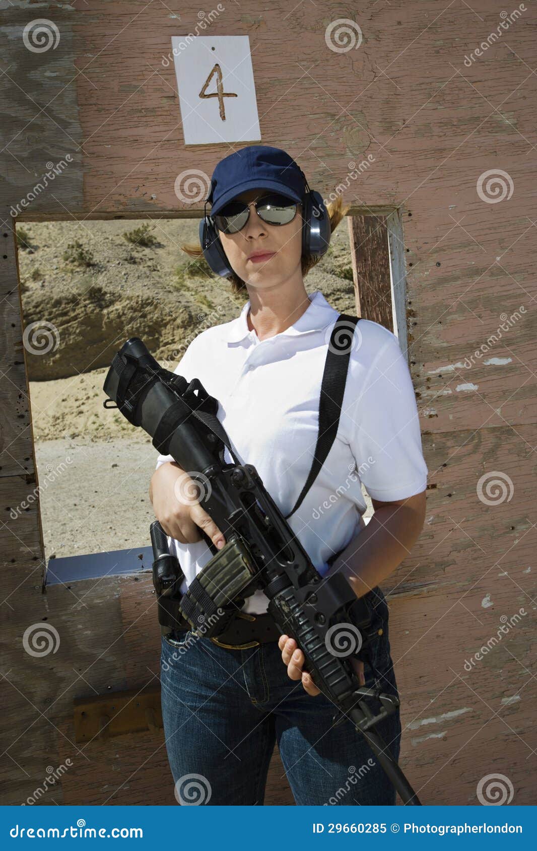 Woman Holding Machine Gun at Firing Range Stock Image Image of casual