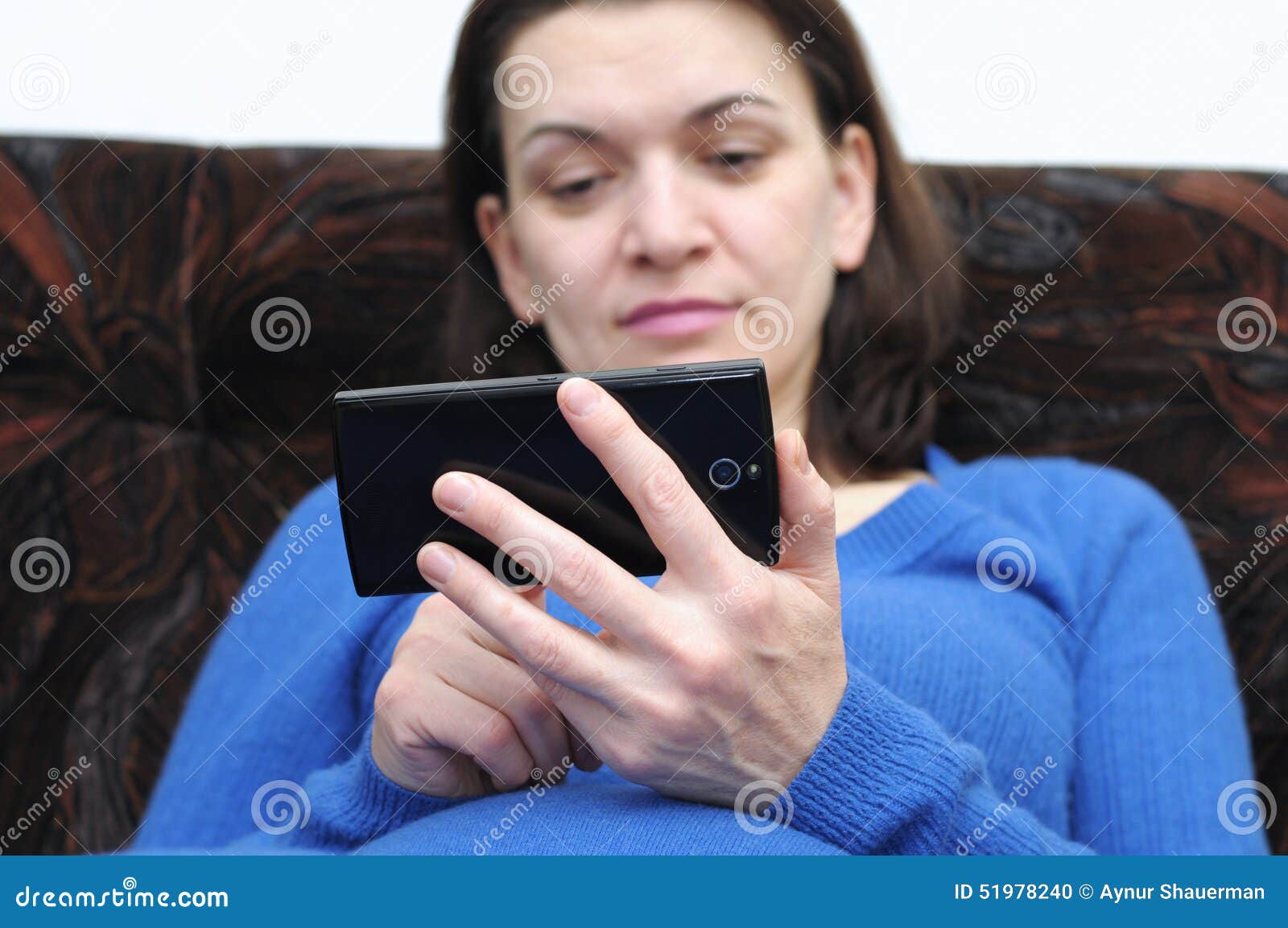Woman holding phone stock photo. Image of beautiful, telephone 51978240