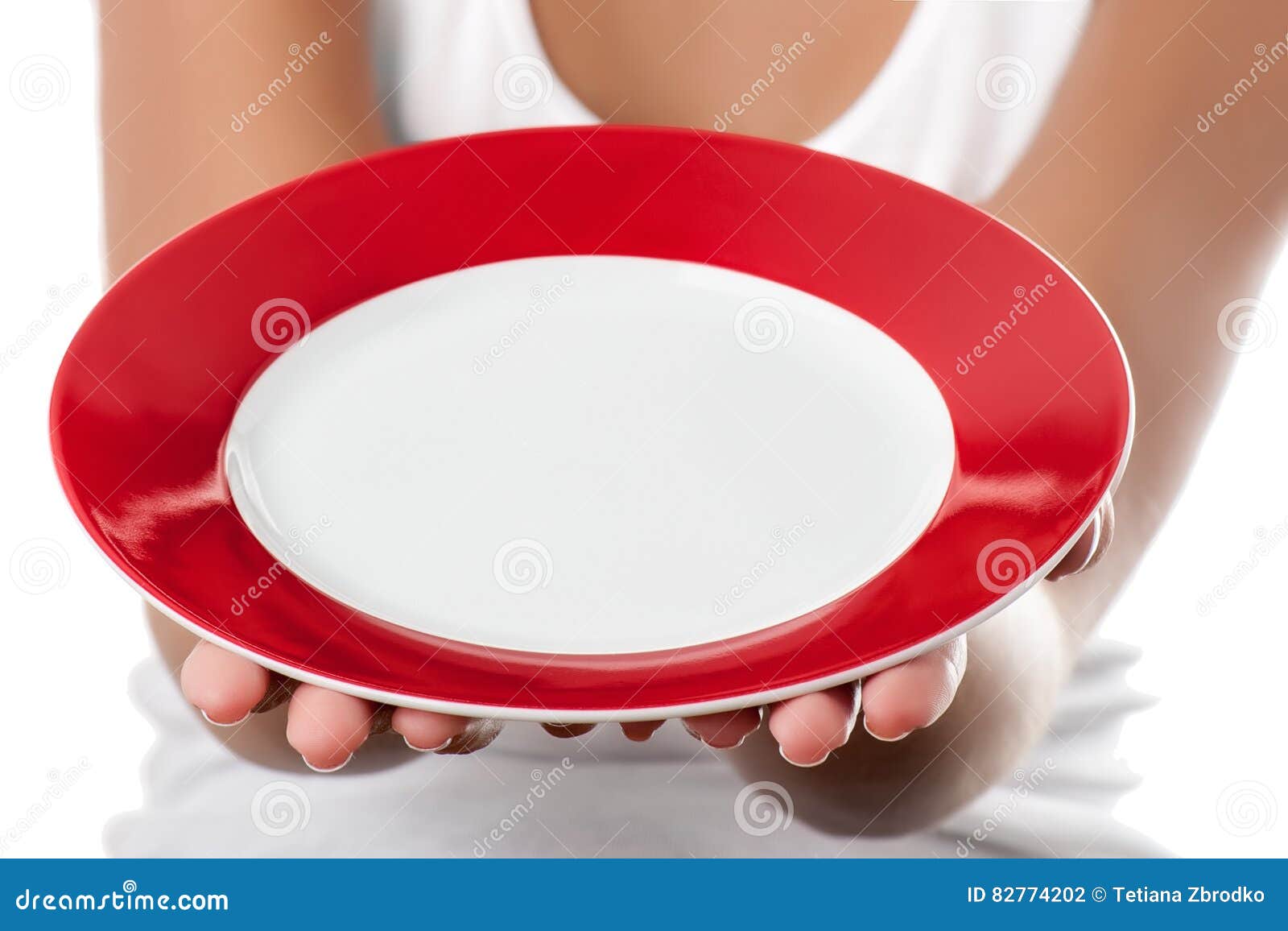 Woman holding plate stock photo. Image of palm, closeup 82774202