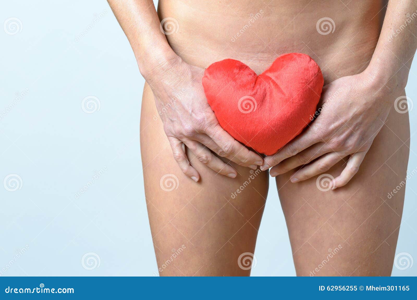 girl holding her vagina Girl holding her vagina