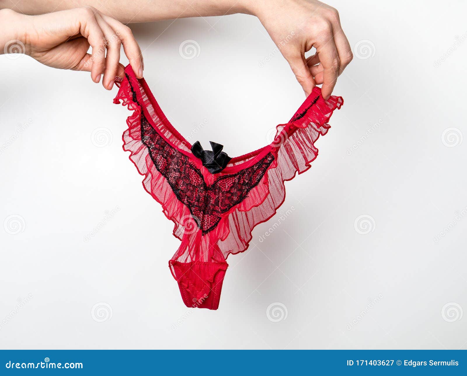 Woman Holding Red Panties on White Background Stock Image - Image