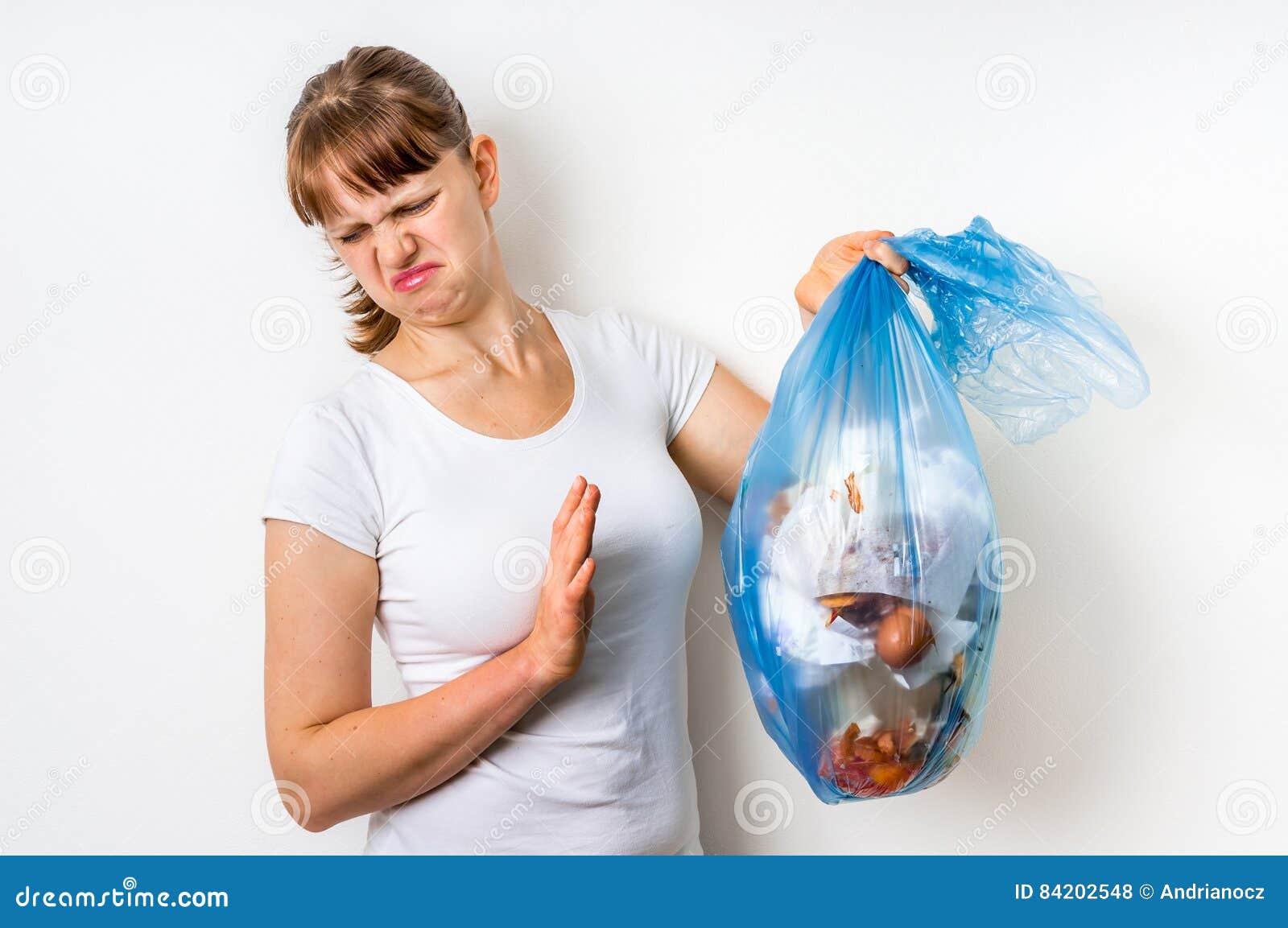 Woman Holding a Smelly Garbage Bag Stock Photo - Image of caucasian ...