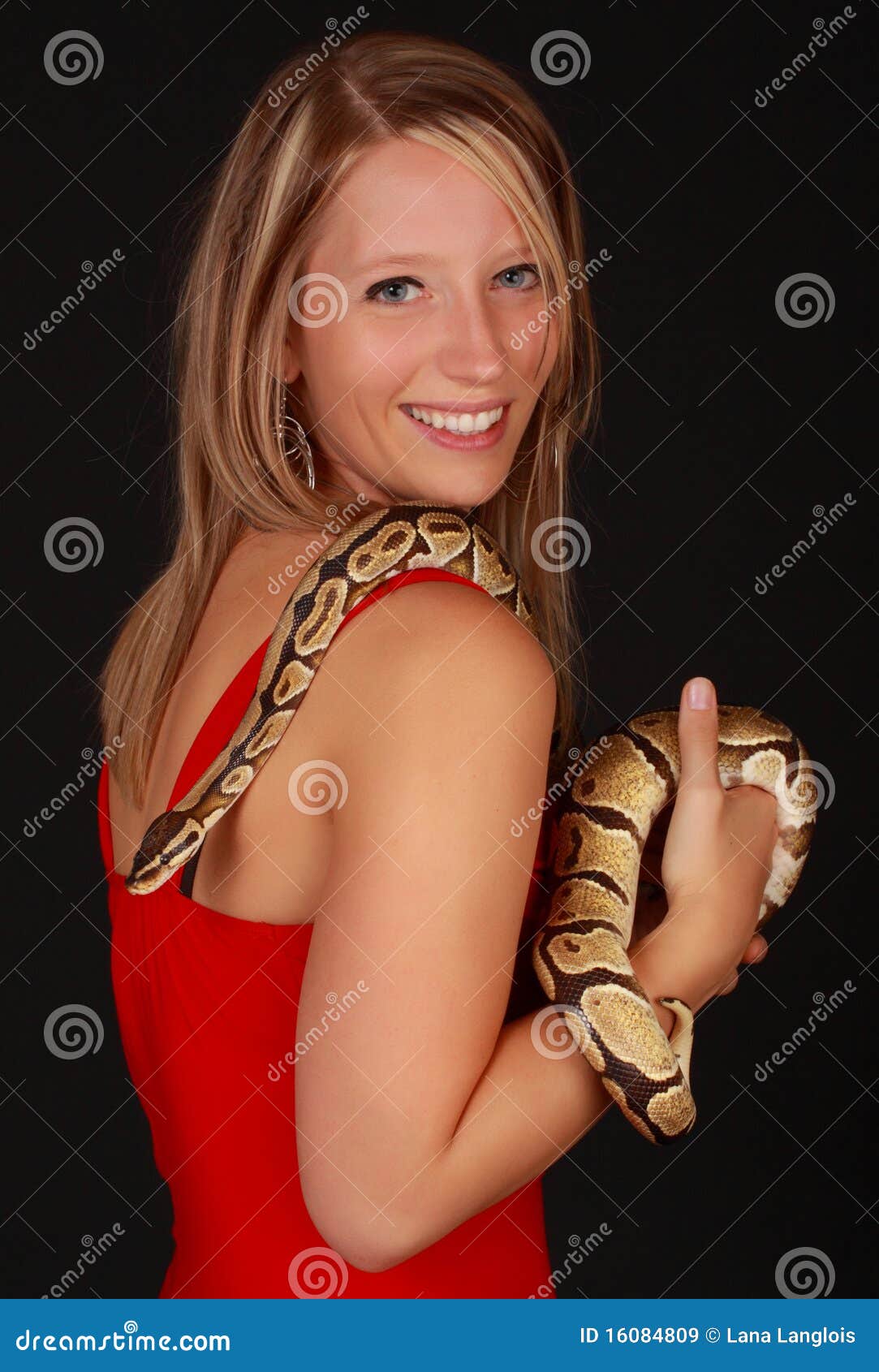 Woman holding a snake stock image. Image of blond, python - 16084809