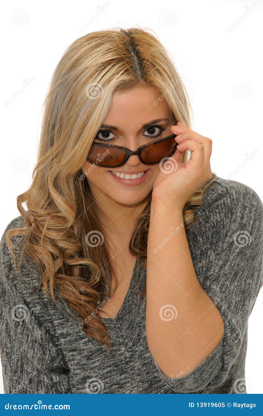 Woman holding sunglasses stock image. Image of adult 13919605