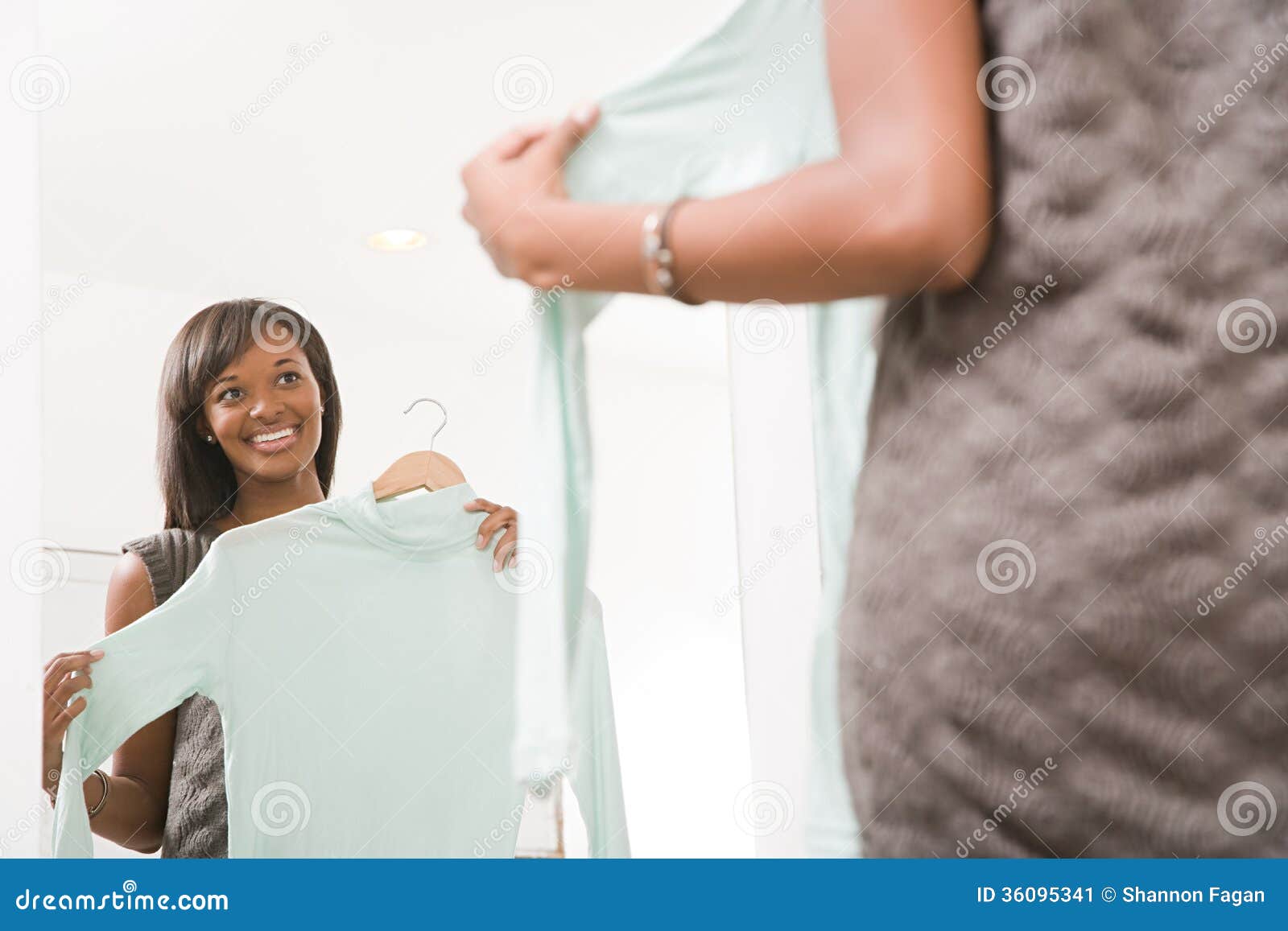 Woman holding a sweater stock image. Image of decor, african - 36095341