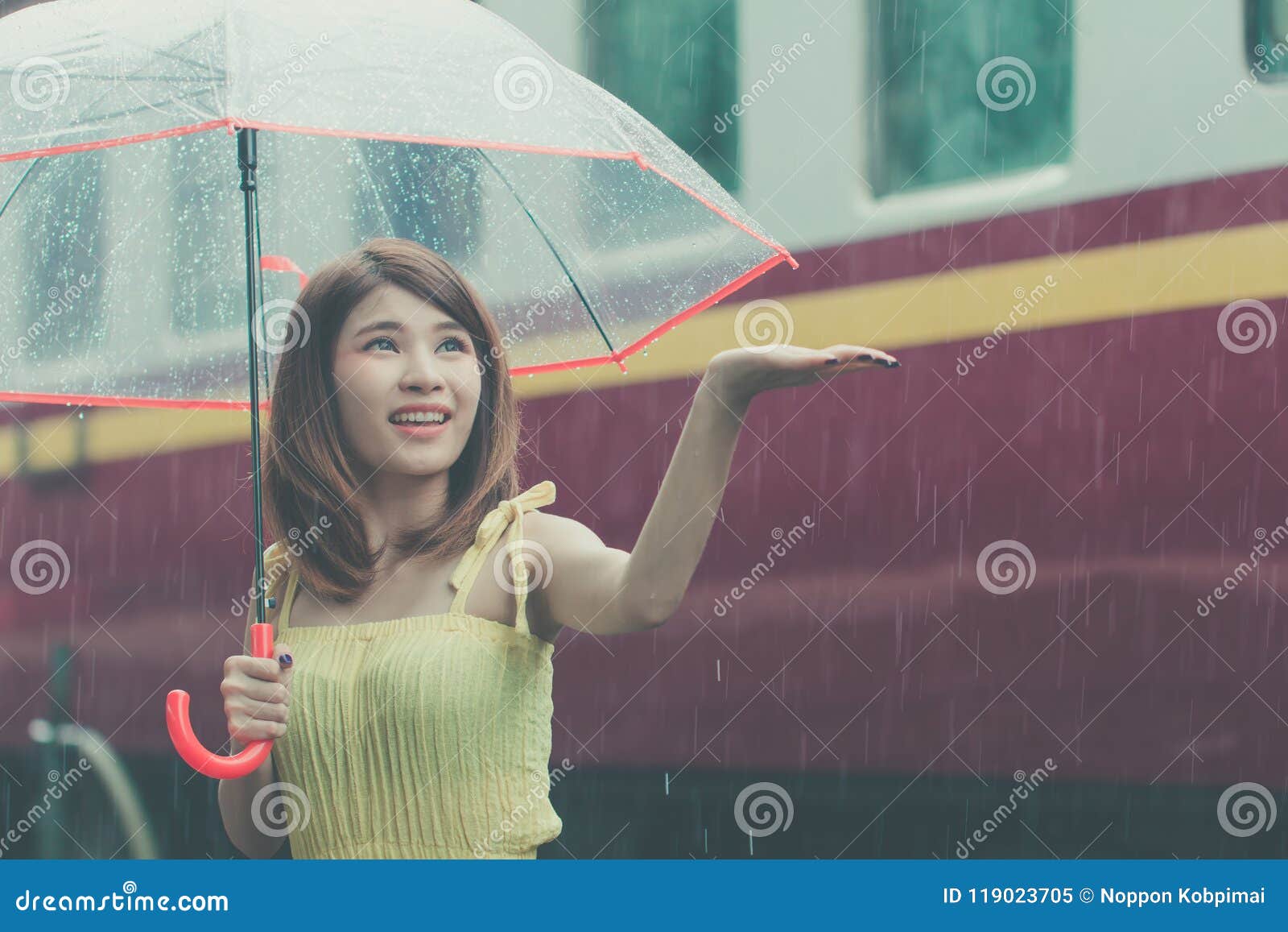 Woman Holding Umbrella in Rainy Day. Asian Girl on Spring Season ...