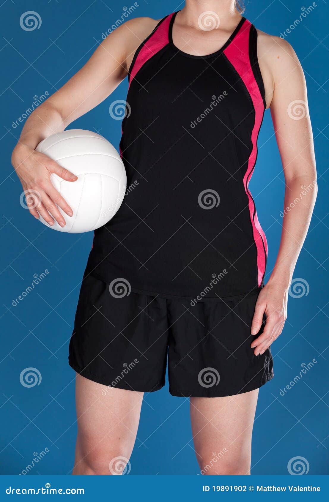 Woman holding a volleyball stock photo. Image of blue 19891902