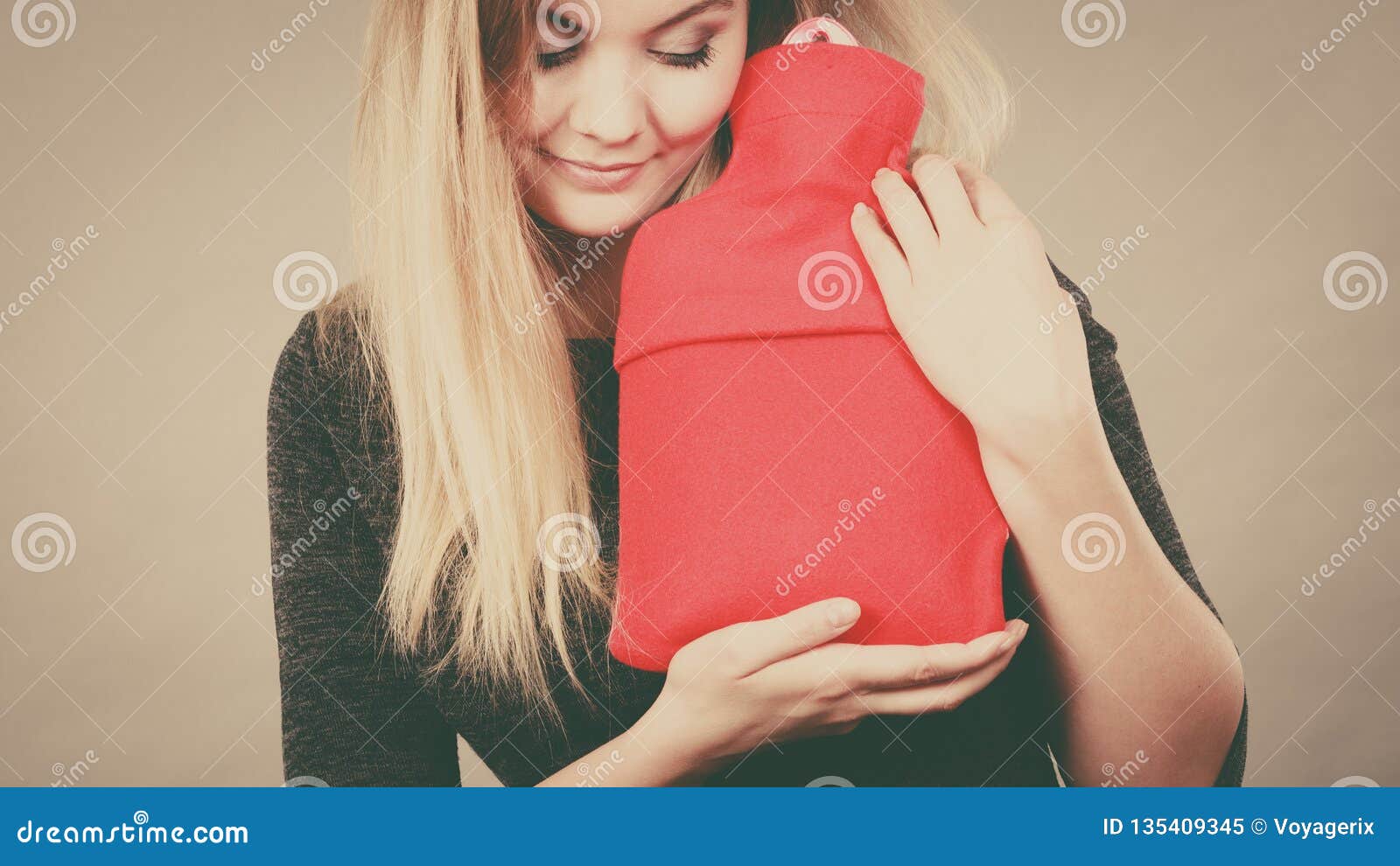 Woman Holding Warm Red Hot Water Bottle Stock Image - Image of bottle