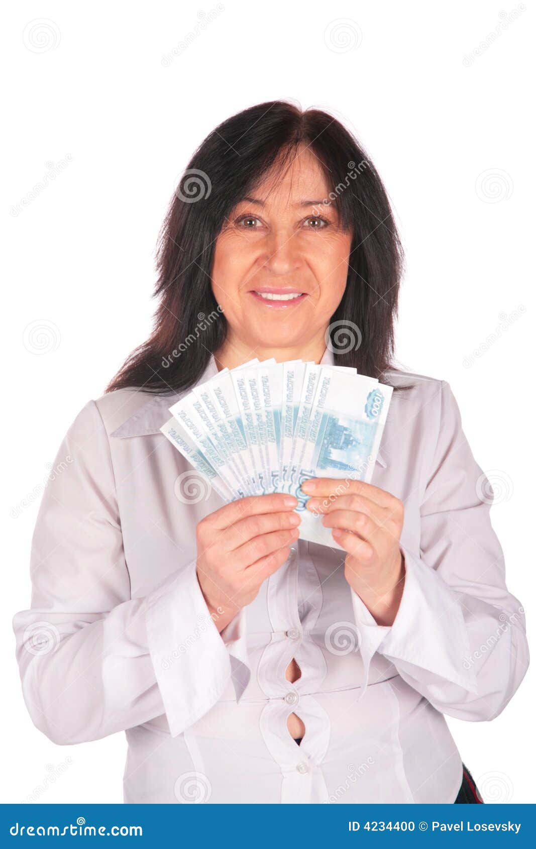 woman holds rubles