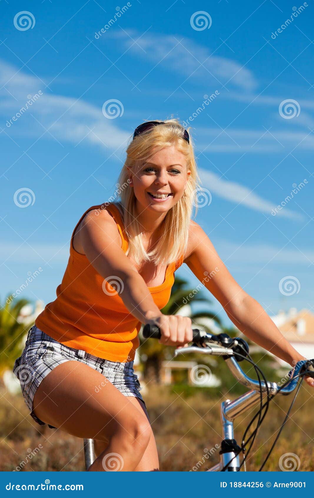 Woman in holidays cycling stock photo. Image of cycling 18844256