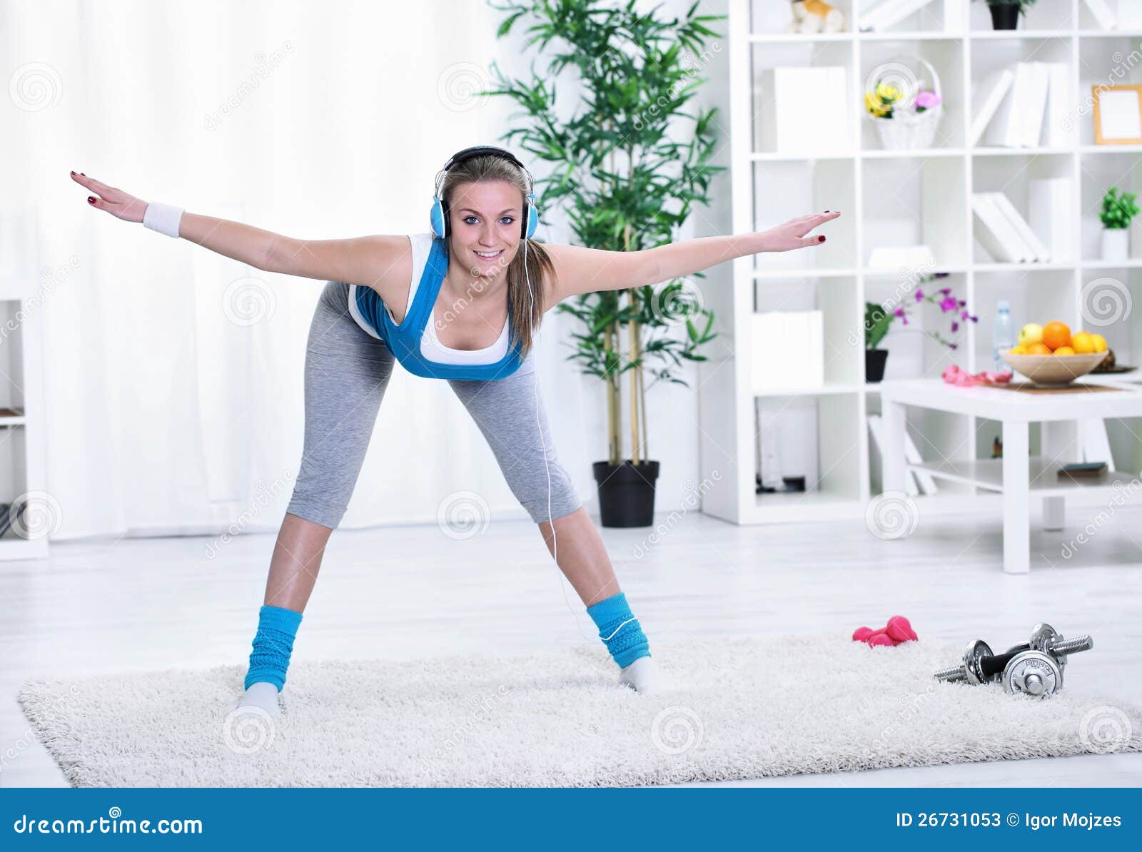 Woman at Home Stretching and Exercising Stock Image Image of house