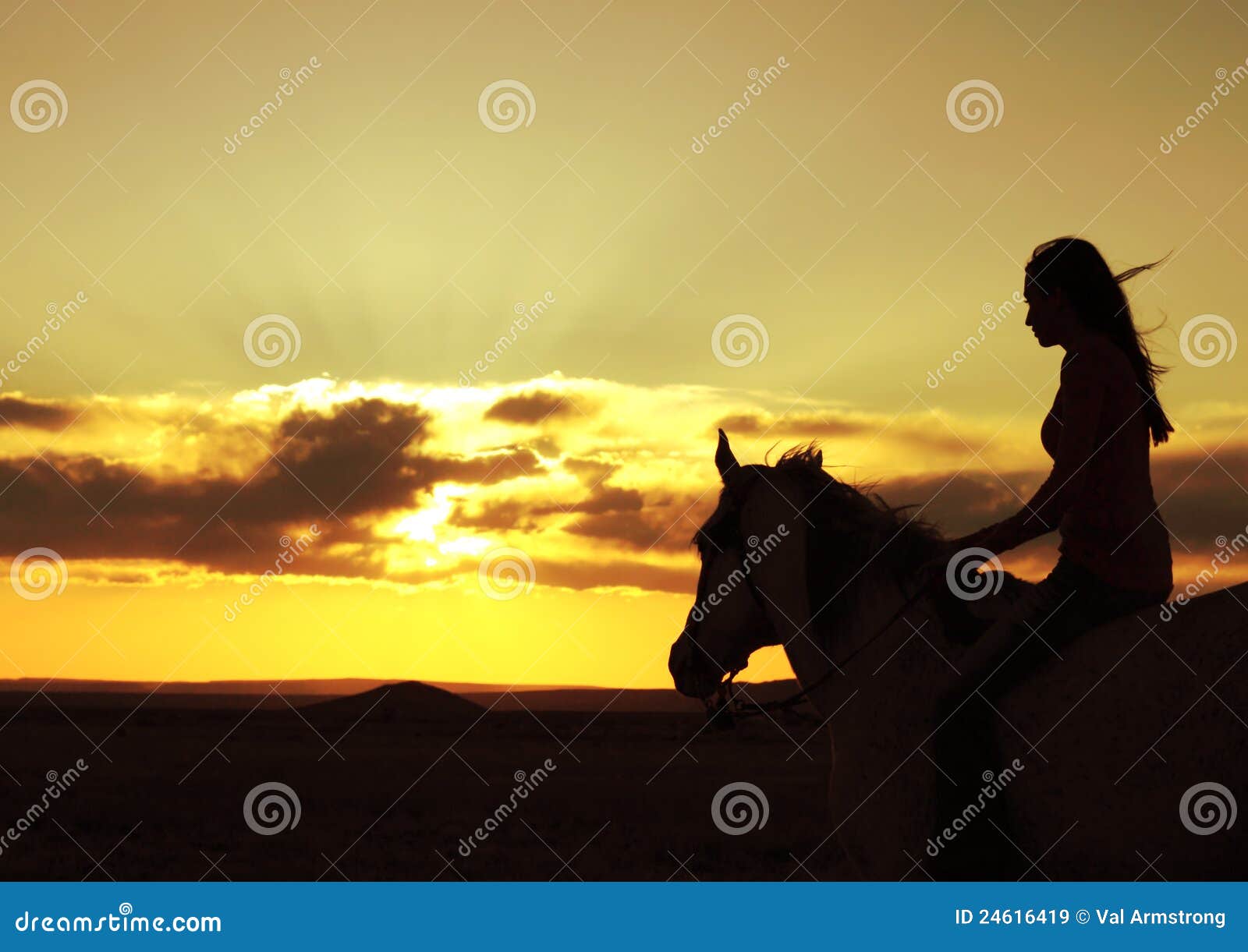 Golden-Haired beauty riding at the beach