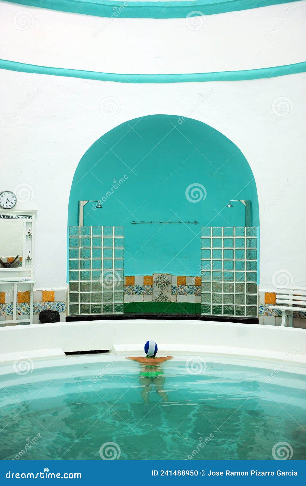 woman inside the roman pool of the spa of alange -balneario- famous thermal bath in the province of badajoz, spain