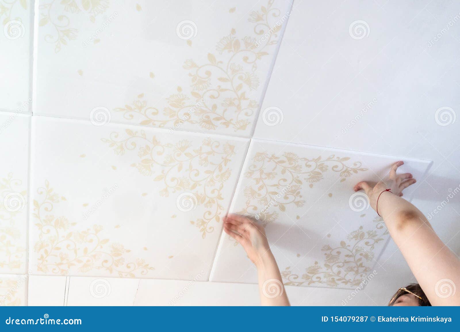 Woman Installing Styrofoam Ceiling Tiles Stock Image Image Of