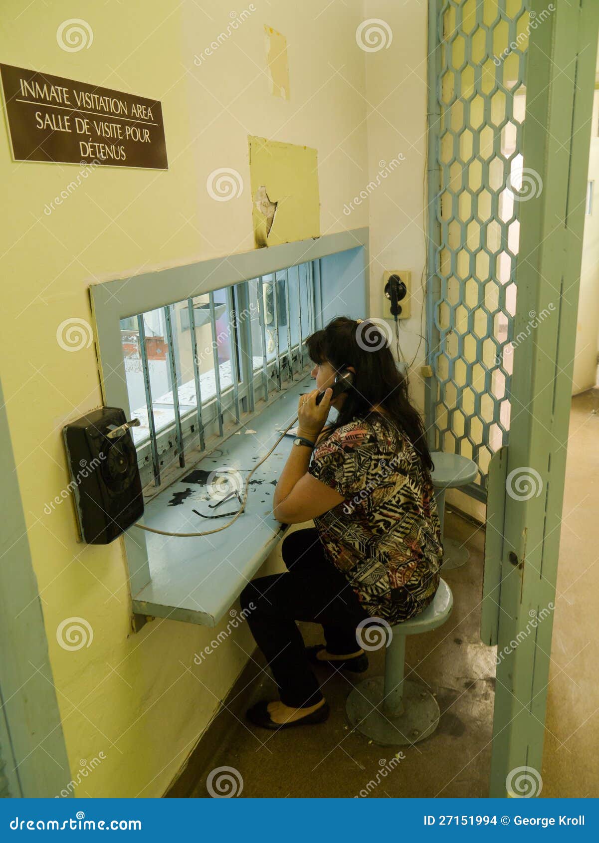 woman at jail prison visit area