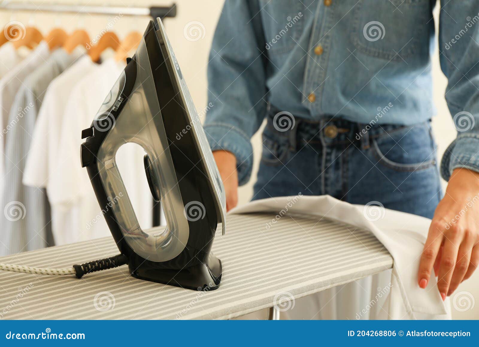 Woman in Jeans Ironing Shirt with Iron Stock Photo Image of female