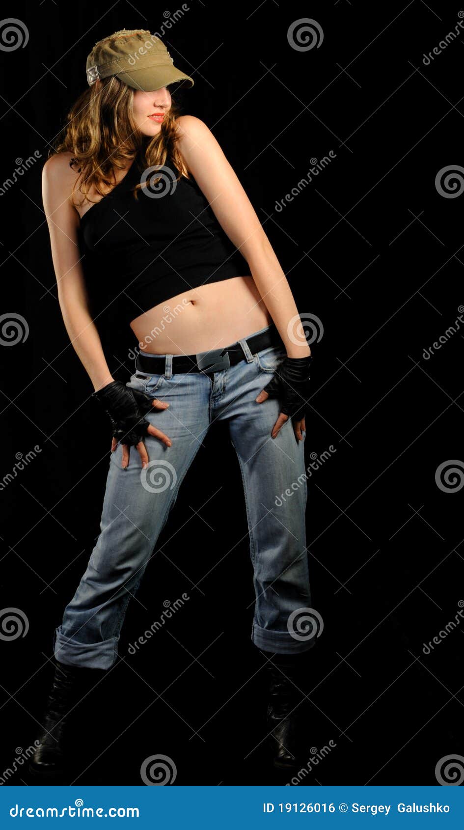 The Woman in Jeans and a Stylish Cap Stock Photo Image of background, skin 19126016