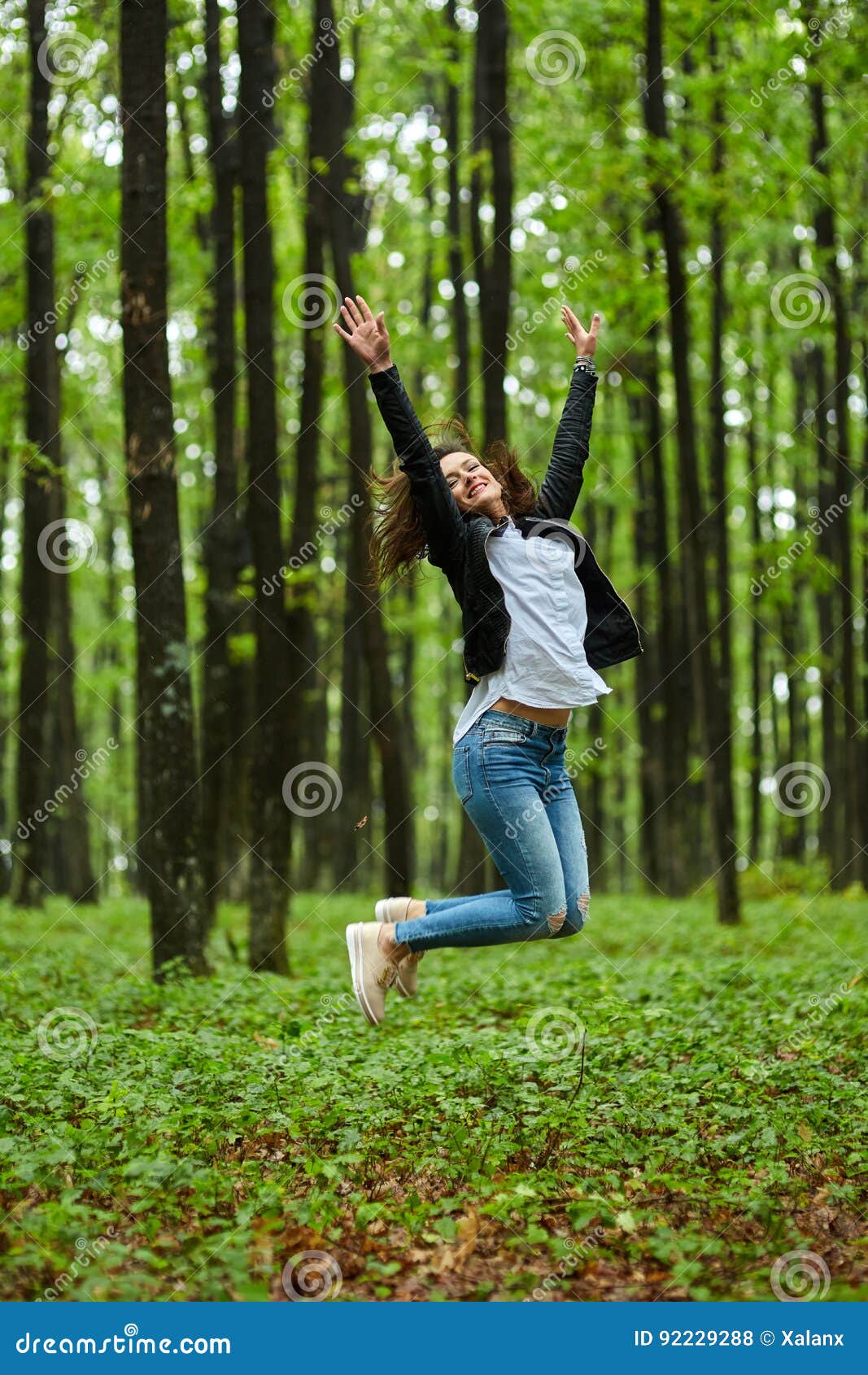 Woman Jumping For Joy Stock Photo Image Of Carefree 92229288