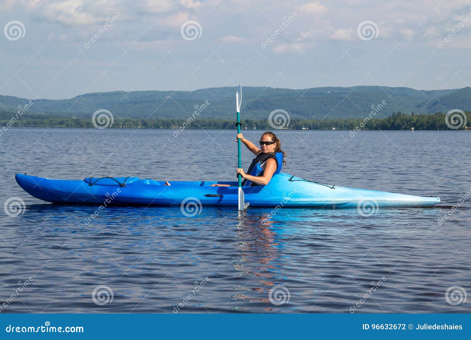 Woman Kayaking on a Calm Lake Stock Photo Image of quebec, nautical