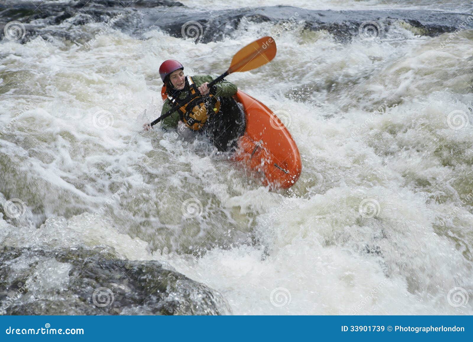 woman kayaking in river