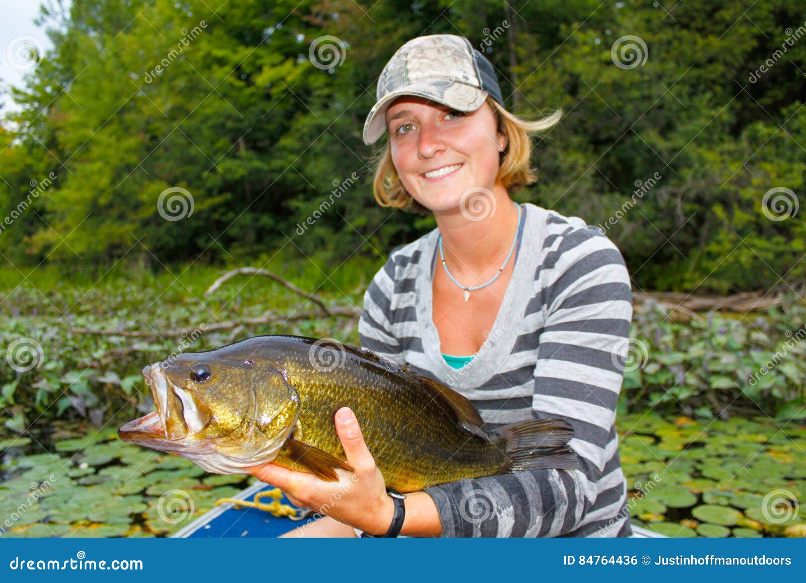 woman large mouth bass fishing