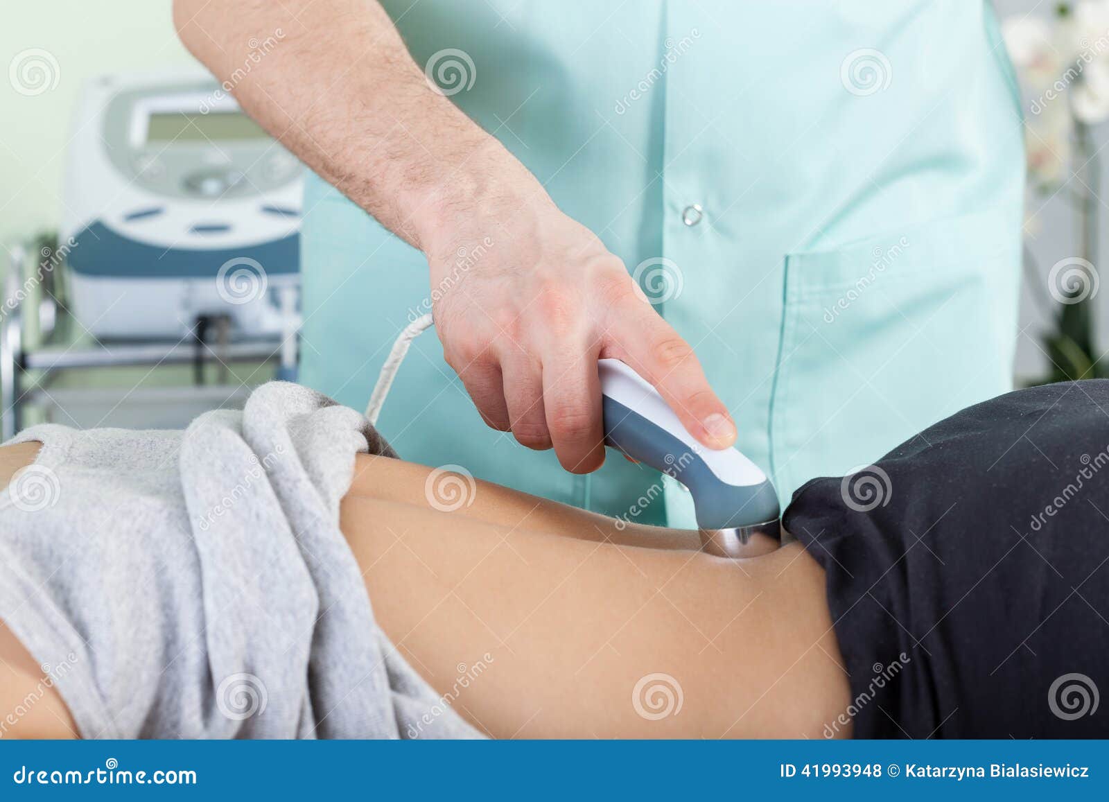 woman during laser physiotherapy