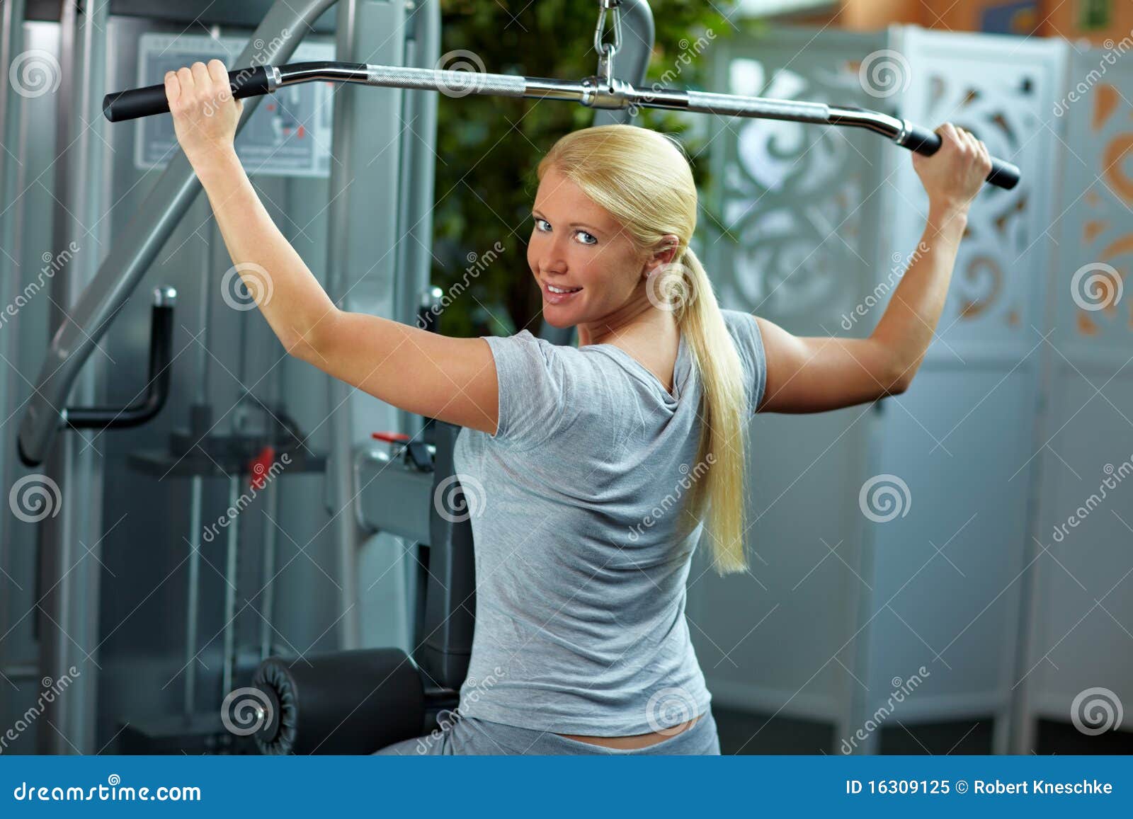 Woman at lat machine stock image. Image of muscle, beauty - 16309125